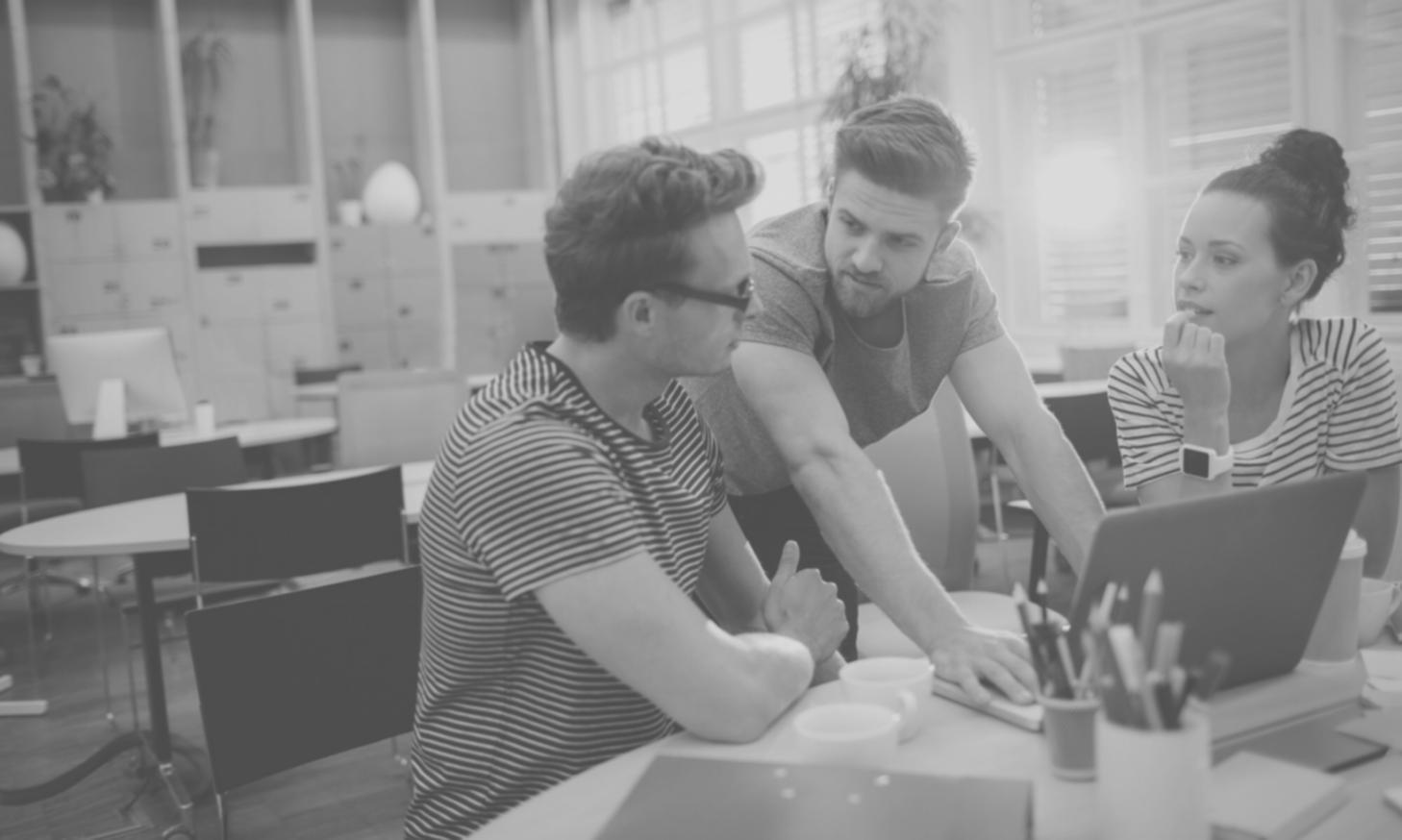 Financial modelling workshop session with students collaborating on complex business cases