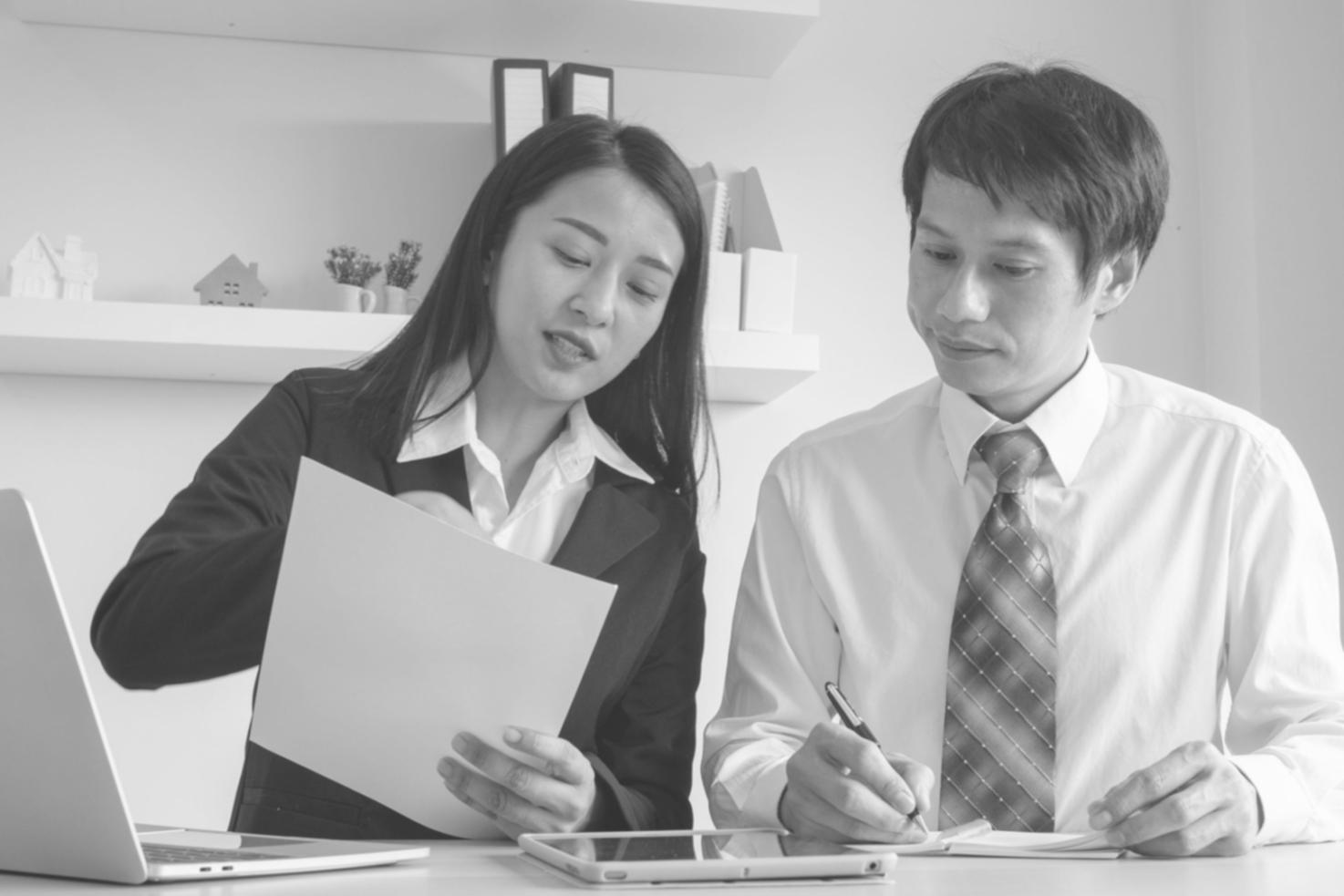 Professional financial modeling workspace with charts and analysis